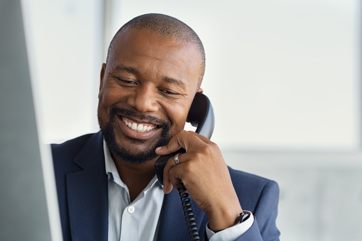 Business professional on phone using WiFi for business communication