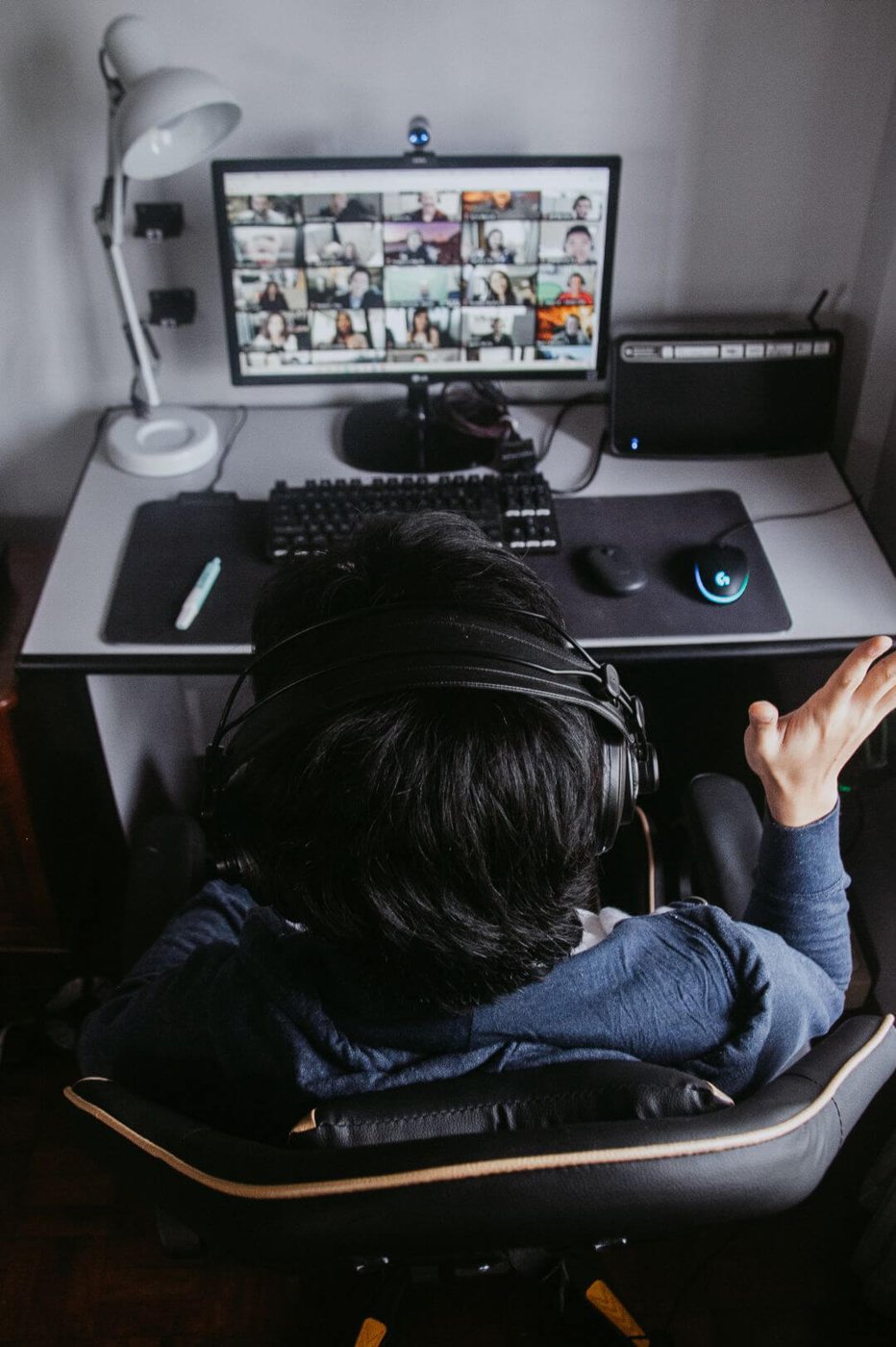 Professional on video call using fast fiber optic internet connection in office