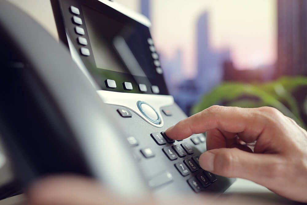 Home phone services device for reliable communication at home